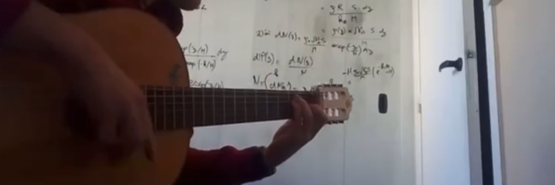 Playing acoustic guitar