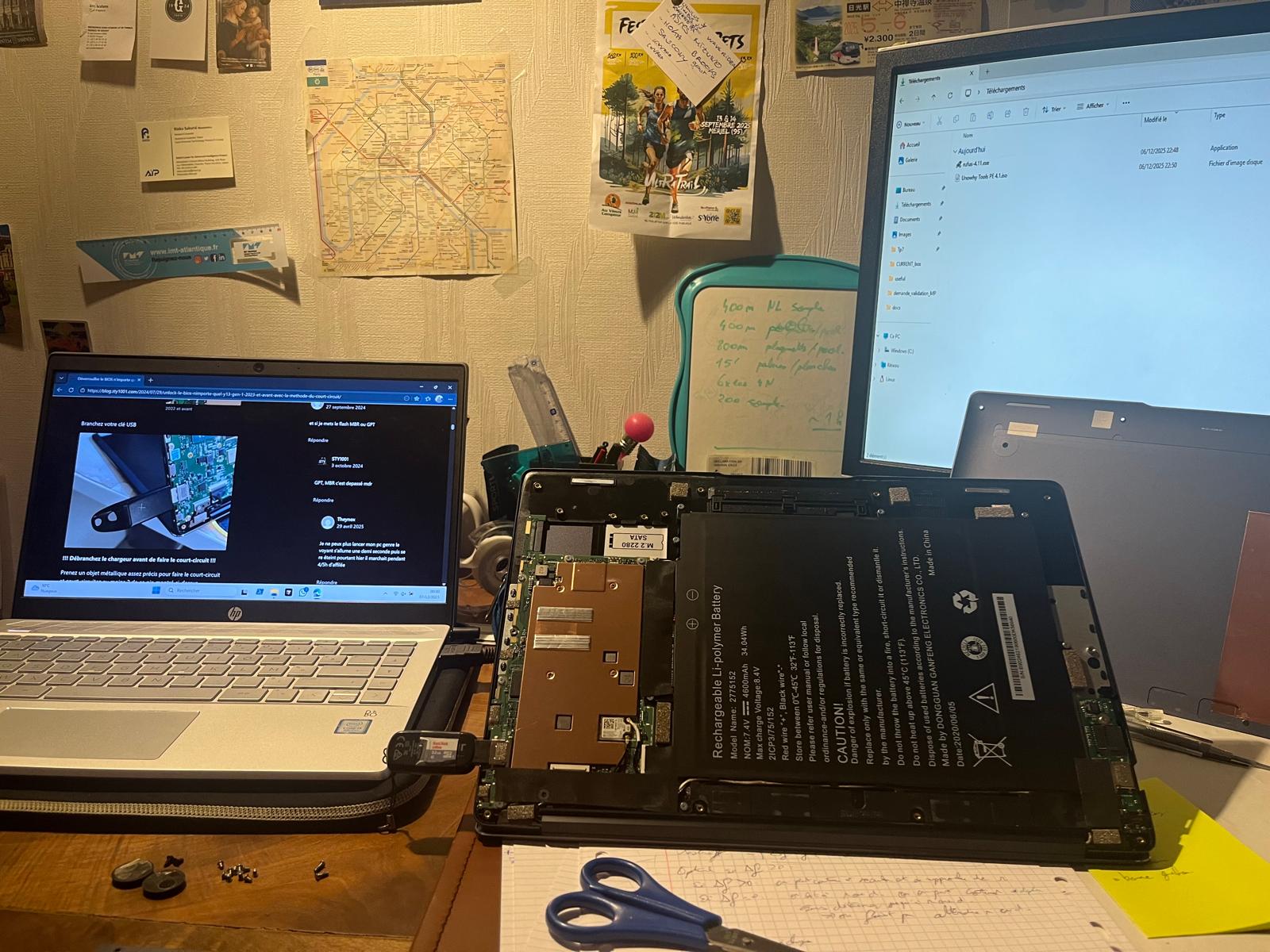 Disassembled Y13 laptop with BIOS unlock guide and Debian USB key