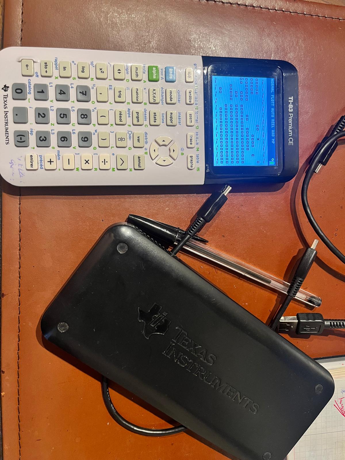 TI-83 Premium CE running Conway's Game of Life